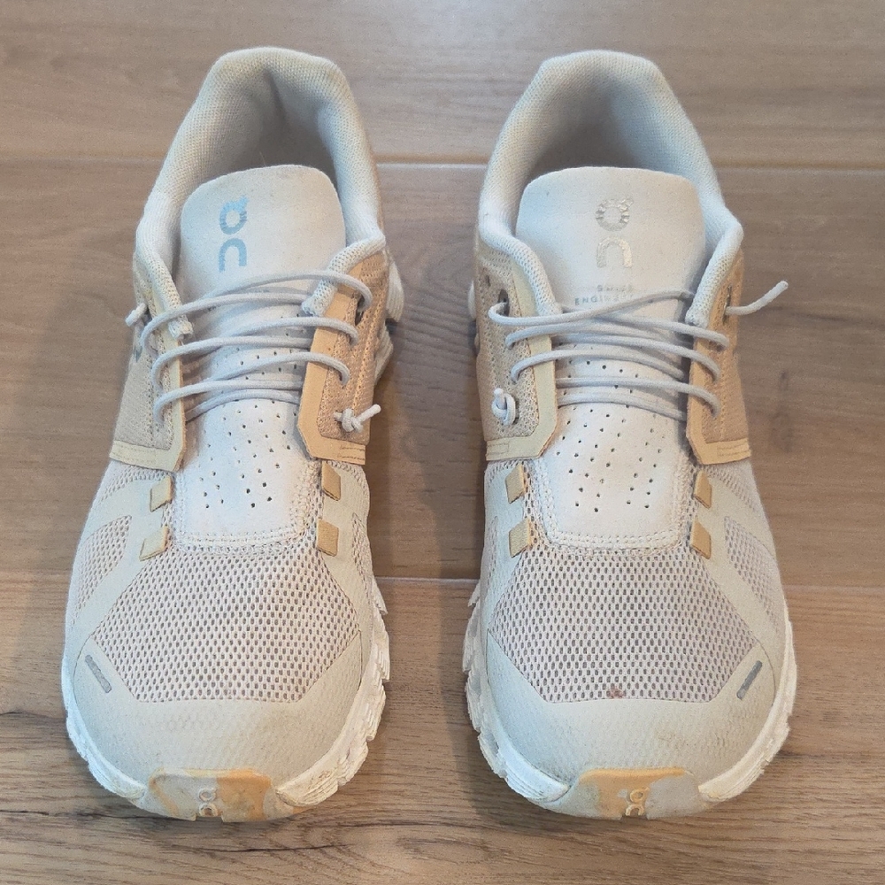 On Running Cream and Tan Sneakers